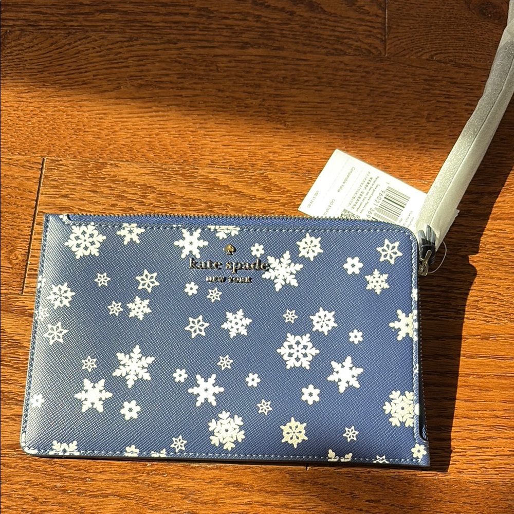 Kate Spade Blue Snowflake Wristlet. New with tags.